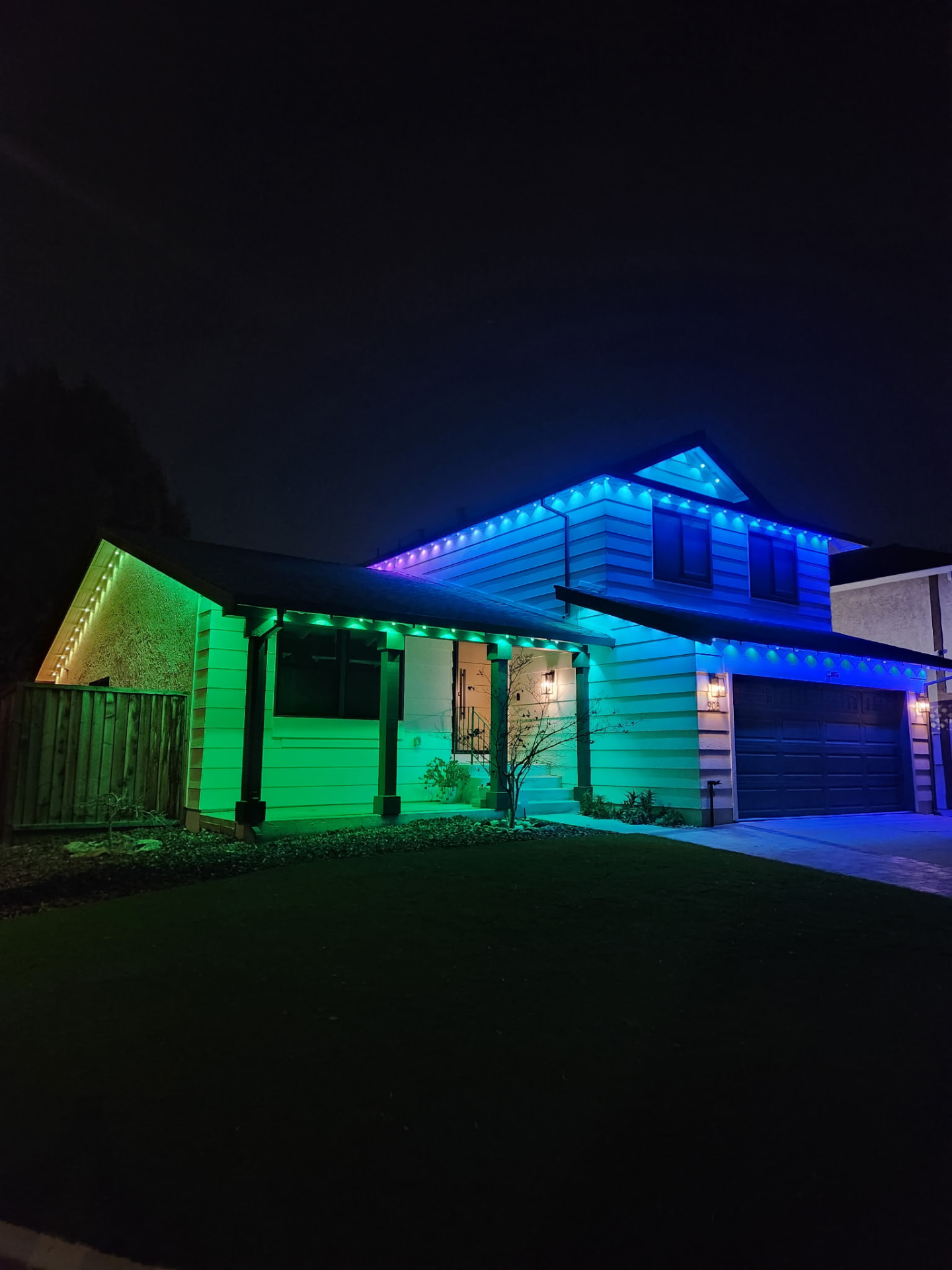Bay Area home at night with permanent Govee roofline lighting